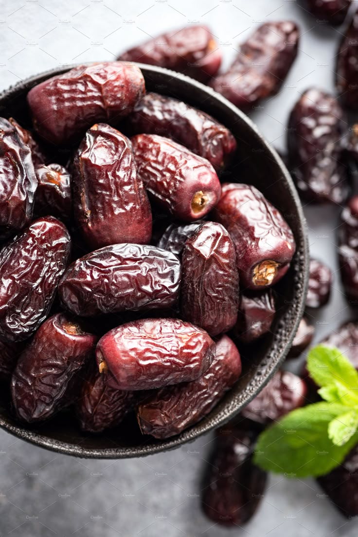 Dried medjool dates in bowl containing ramadan, food, and date